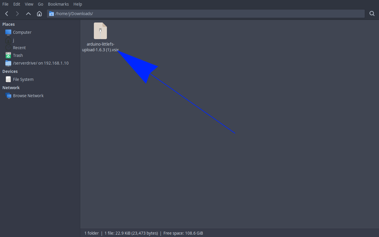 Downloads folder showing the downloaded .vsix file
